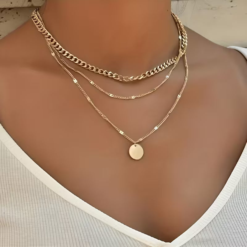 Elegancki wielowarstwowy naszyjnik z okrągłą zawieszką