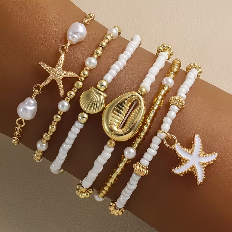 Zestaw 6 złotych bransoletek plażowych