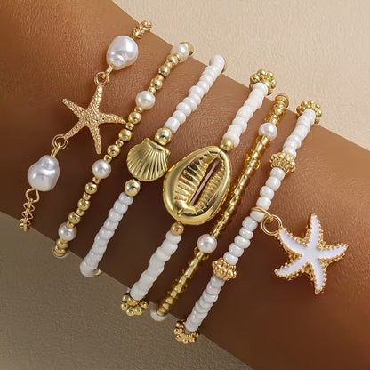 Zestaw 6 złotych bransoletek plażowych